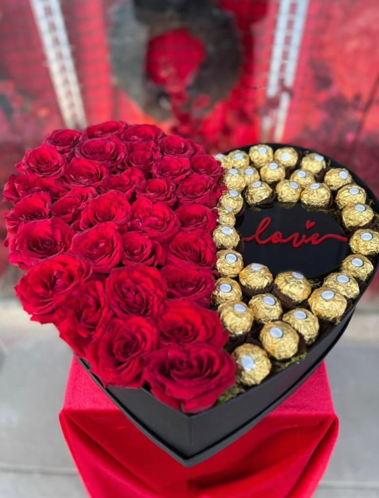 Heart gift box with roses and chocolates